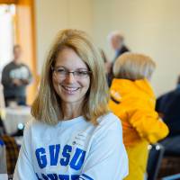 Alumni talking to one another at the Laker Legacy Brunch